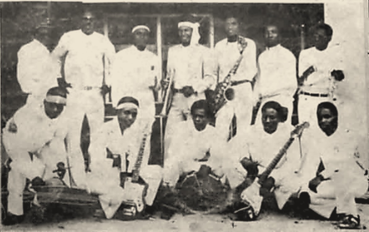 Cleaned archival photograph of Chief Echo Toikumoh with his Field Marshal Era band